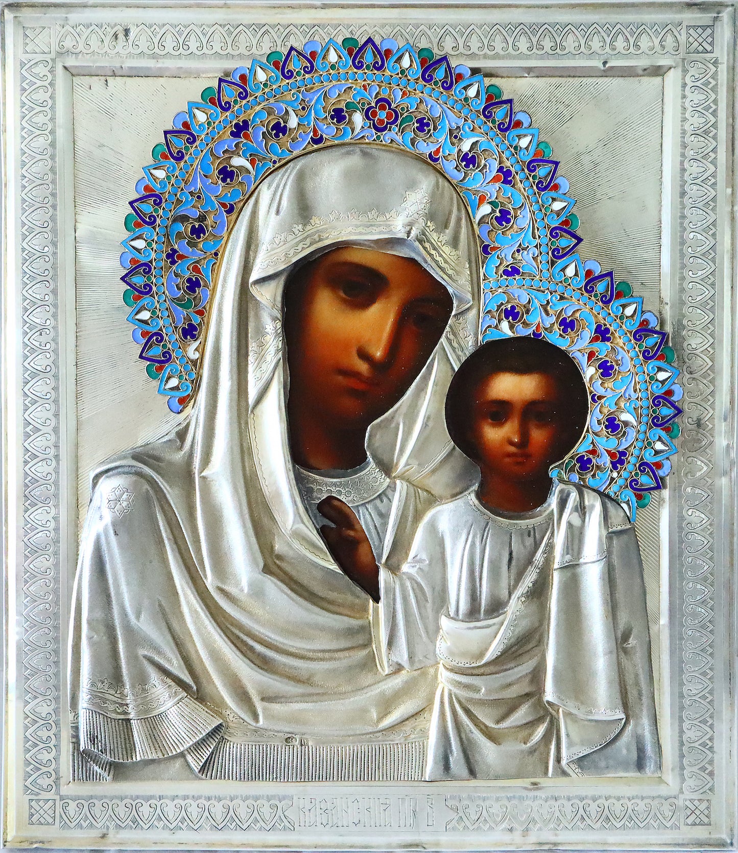Antiques, Orthodox, Russian icon: KAZAN MOTHER OF GOD WITH A SILVER-GILT OKLAD WITH ENAMEL HALO. | 5348 |