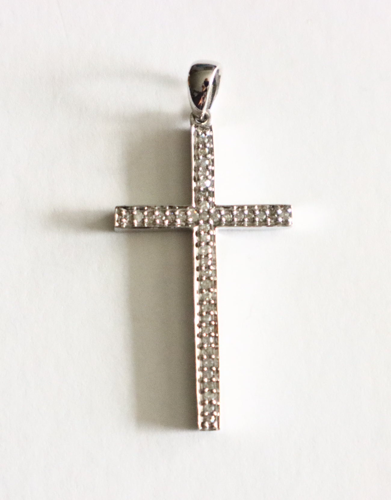 4889 | 14k. White Gold Cross with diamonds