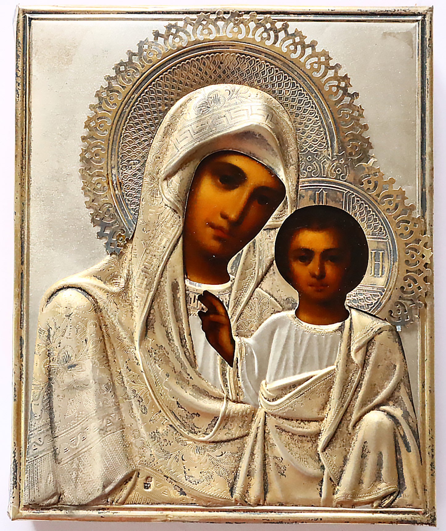 Antiques, Orthodox Russian icon: KAZAN MOTHER OF GOD with silver cover. | 5852 |