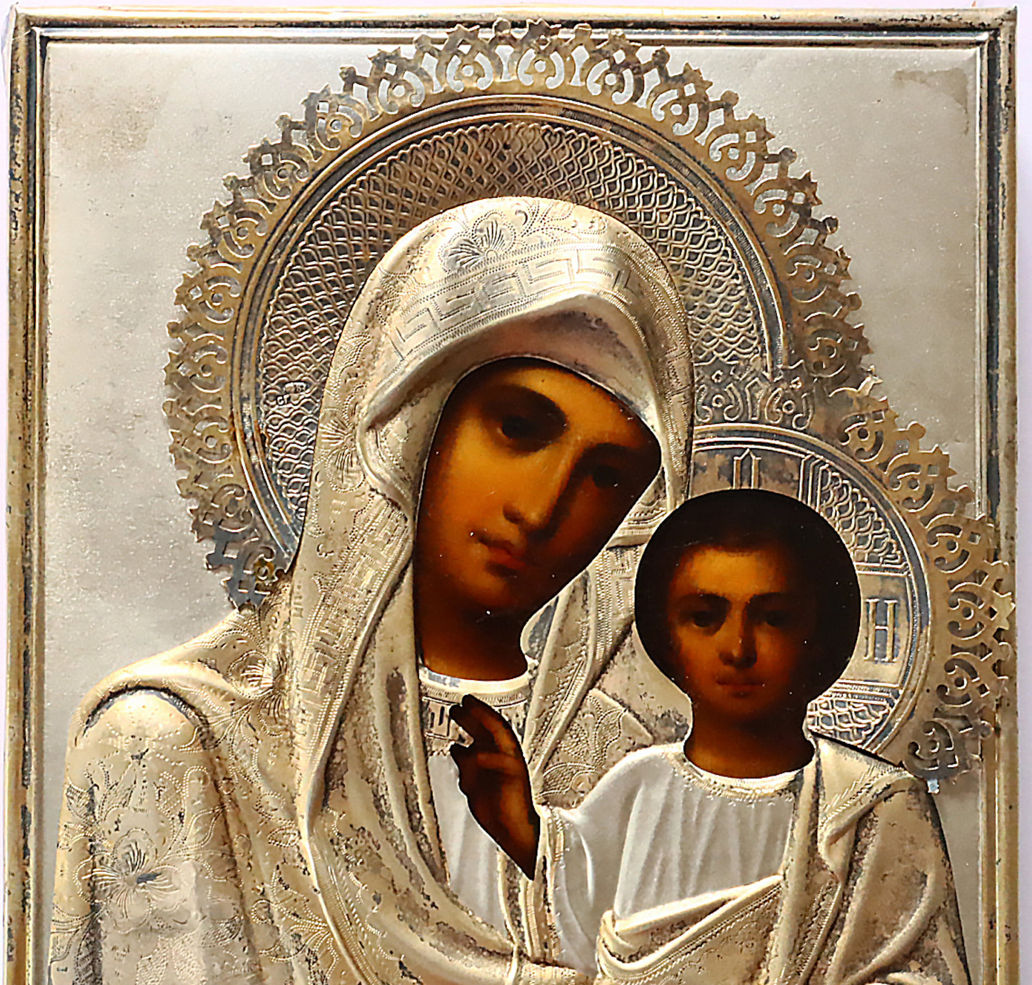Antiques, Orthodox Russian icon: KAZAN MOTHER OF GOD with silver cover. | 5852 |